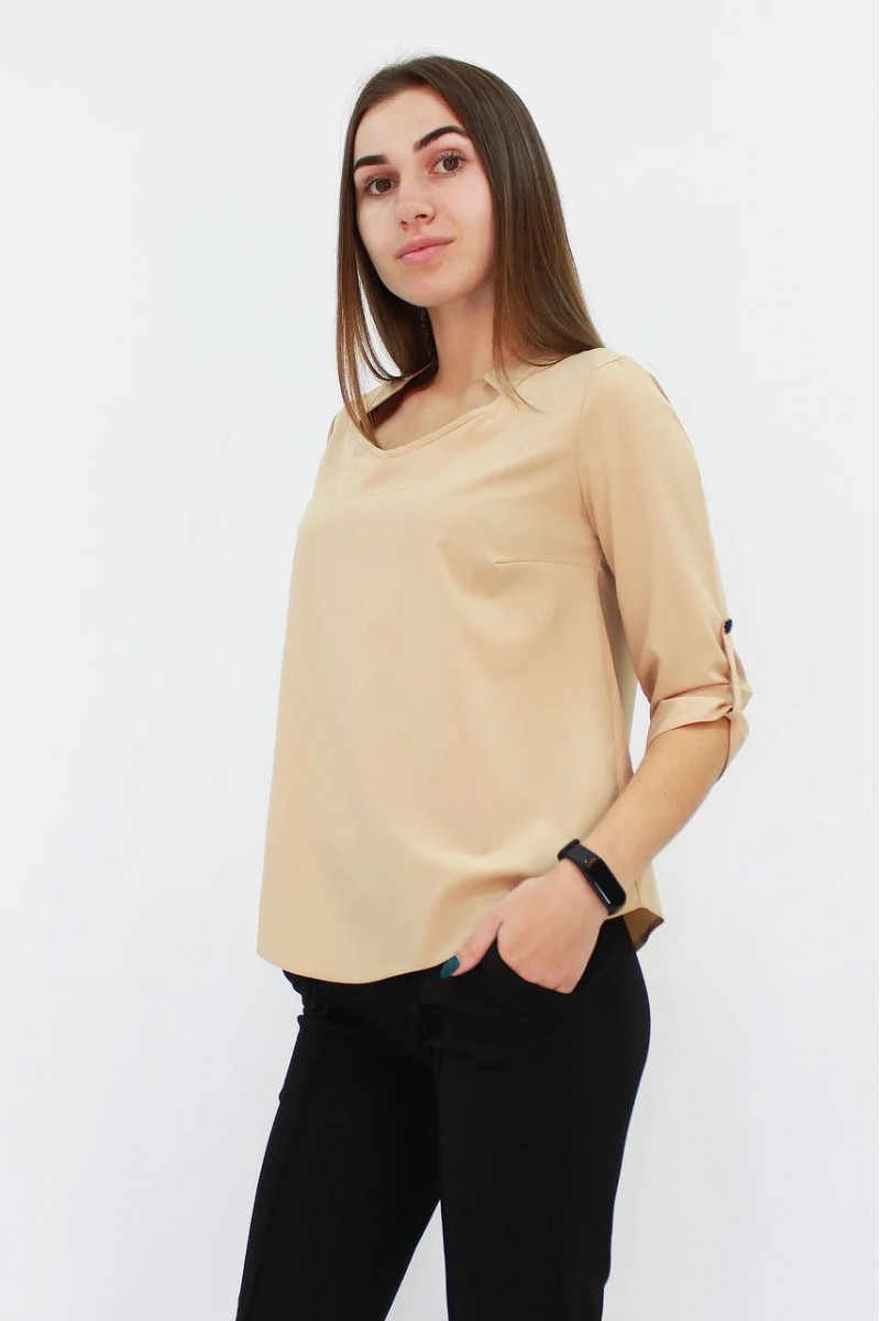 Стильна жіноча блузка вільного крою кольору бежева